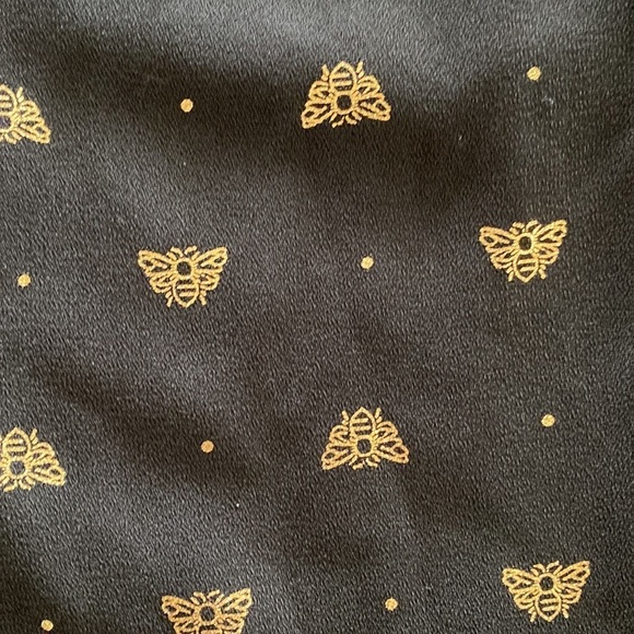 Lauren Conrad Size XS Black and Gold Bumblebee Novelty Print Cold-Shoulder Top - Picture 2 of 3